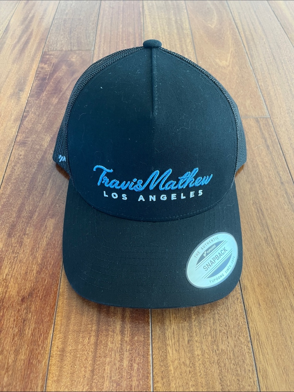 Travis Matthew Los Angeles black trucker cap